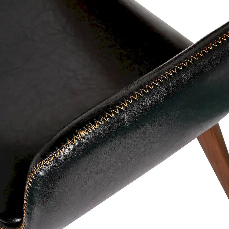 Silla de comedor de mediados de siglo de piel sintética con patas de metal