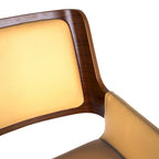 Silla de comedor de mediados de siglo de piel sintética con patas de metal