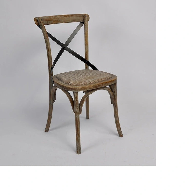 Silla tapizada de ratán con respaldo cruzado Tucken
